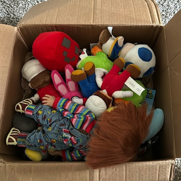 Big assortment of Super Mario plushies and collectibles